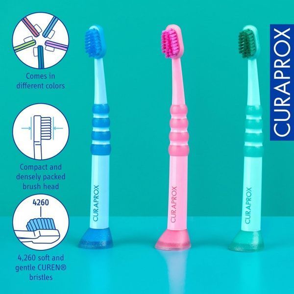 ЗУБНА ЩІТКА ДИТЯЧА CURAPROX CS BABY З ГУМОВАНОЮ РУЧКОЮ (0-4 РОКІВ) 7612412428100 фото